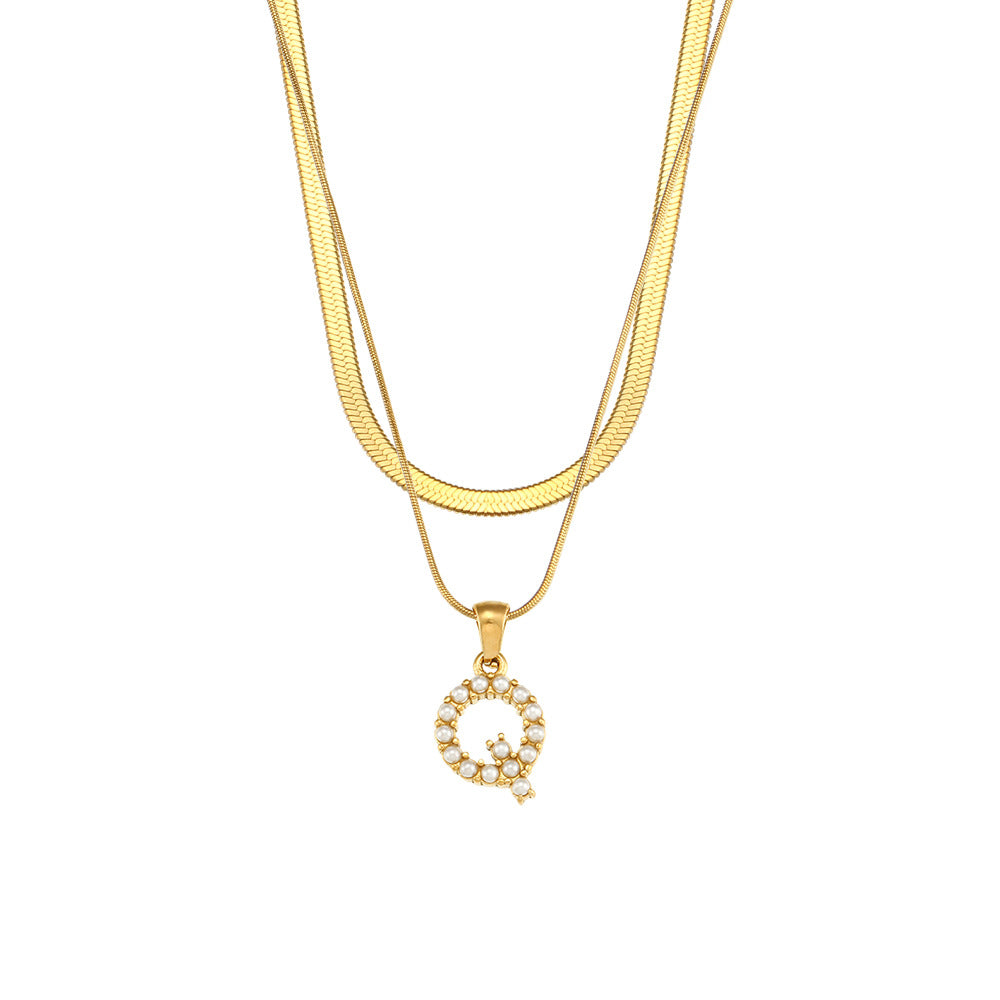 Collier initiale double chaîne doré, lettre Q