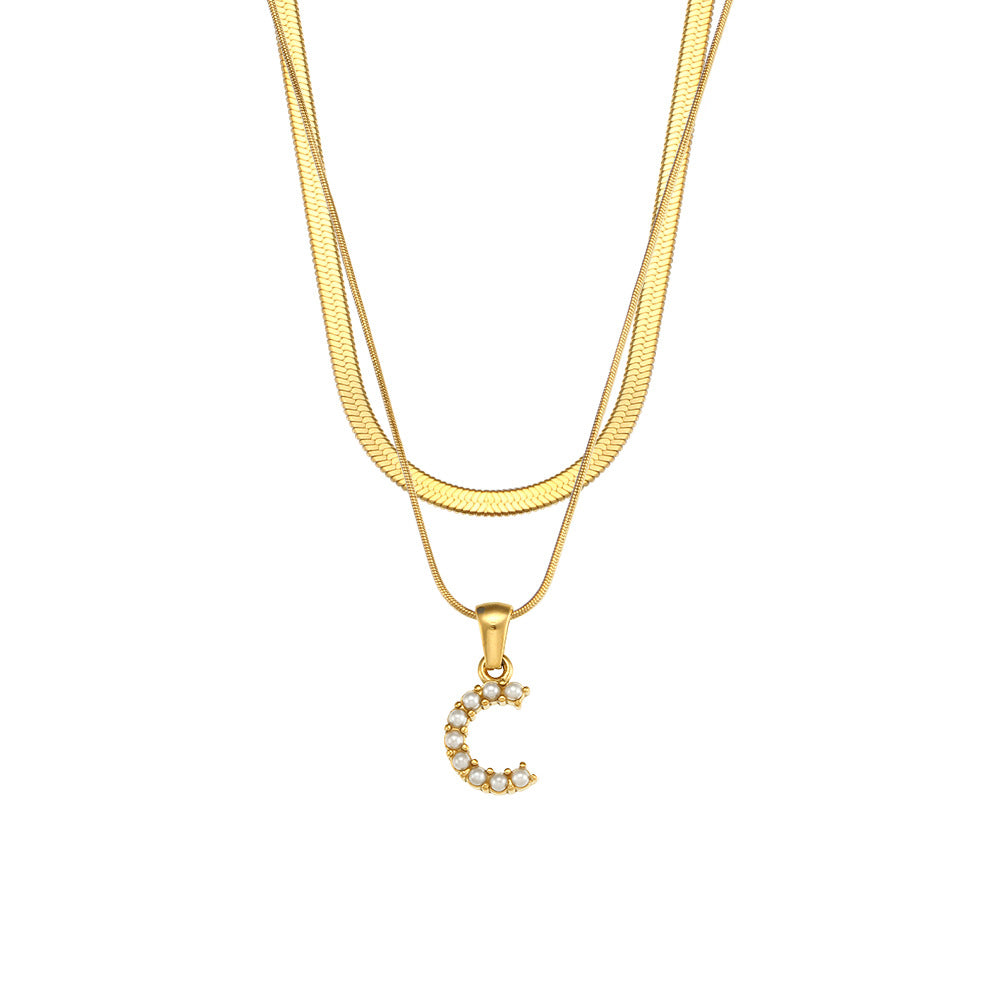 Collier initiale double chaîne doré, lettre E