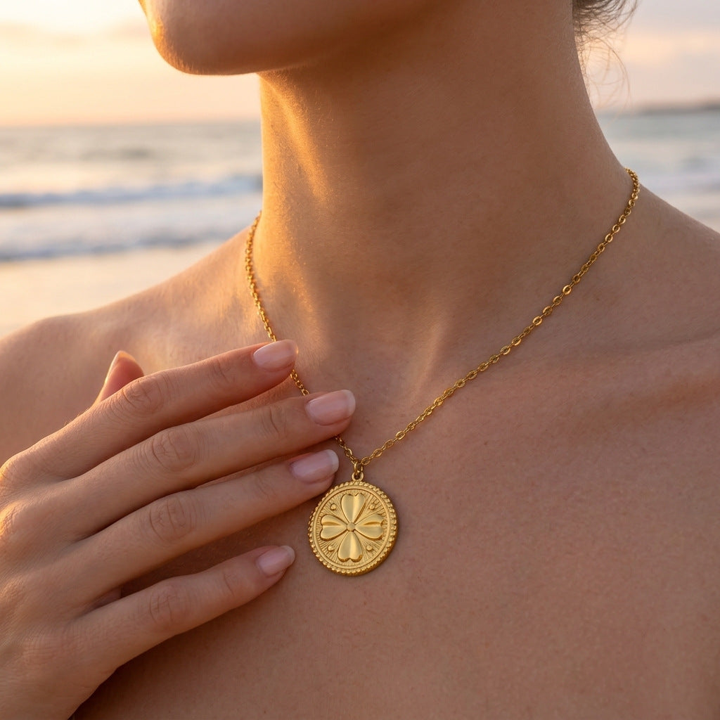 Collier trèfle porte-bonheur doré