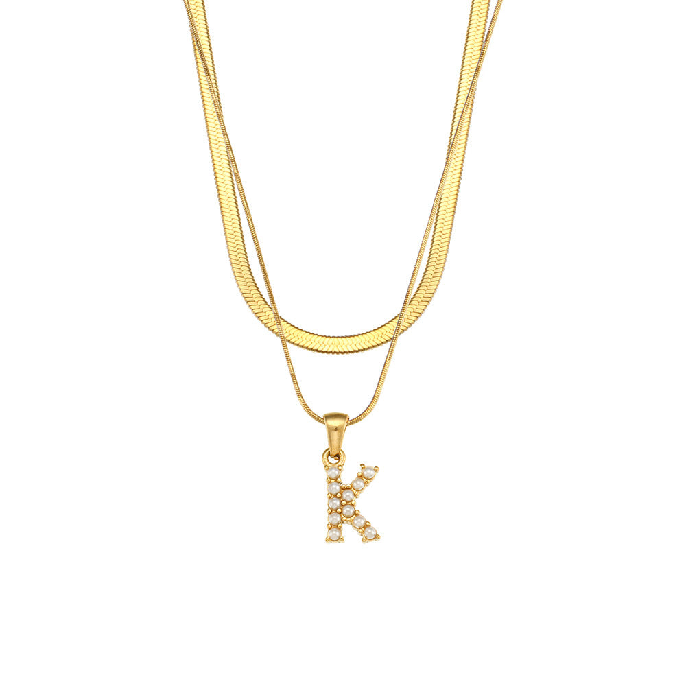 Collier initiale double chaîne doré, lettre K