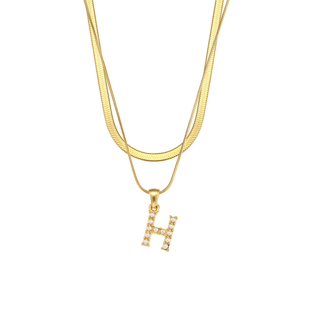 Collier initiale double chaîne doré, lettre H