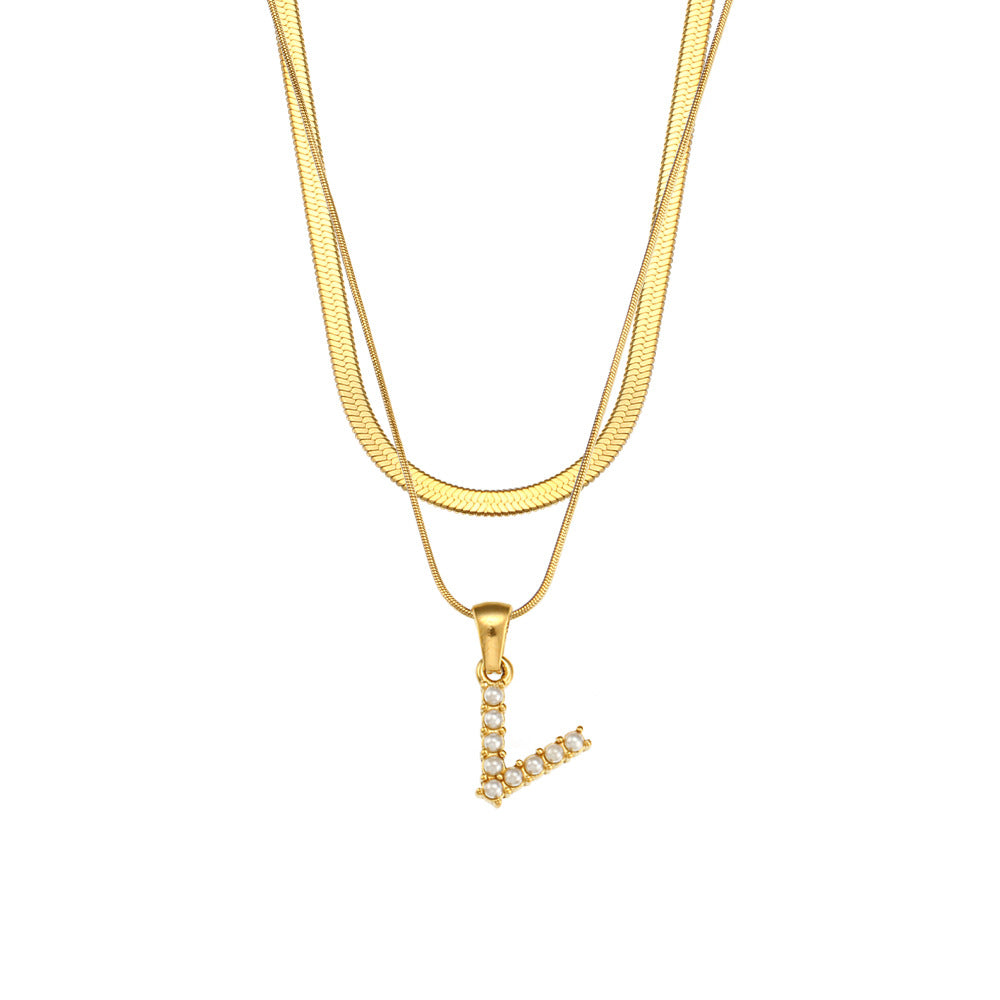 Collier initiale double chaîne doré, lettre V