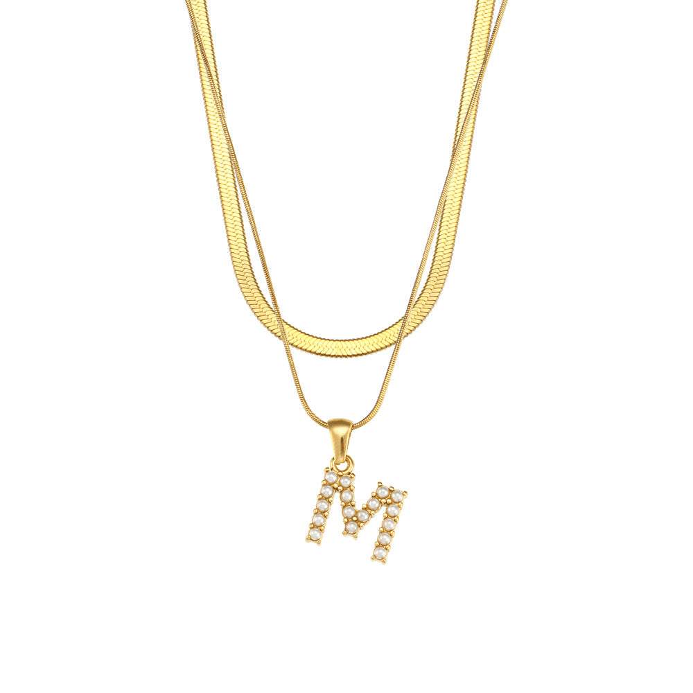 Collier initiale double chaîne doré, lettre M